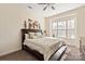 Comfortable bedroom with natural light, featuring plush carpeting and elegant decor at 865 Kathy Dianne Dr, Fort Mill, SC 29707
