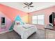 Bright bedroom with unique geometric painted accent wall, plush carpet and a large window at 865 Kathy Dianne Dr, Fort Mill, SC 29707