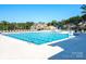 Enjoy the community pool with plenty of seating, a splash pad, and meticulously kept landscaping at 865 Kathy Dianne Dr, Fort Mill, SC 29707