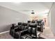A theater room with multiple reclining seats, a projector and a white screen at 865 Kathy Dianne Dr, Fort Mill, SC 29707