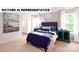 Comfortable bedroom featuring stylish decor, abundant natural light, and an open view to bathroom at 104 Woodhall Way, Troutman, NC 28166