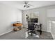 A functional office with a large window for natural light, perfect for working from home at 11420 Glaetzer Ln, Charlotte, NC 28270
