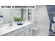 Clean bathroom features a double sink vanity, white cabinets, framed mirror, and tub-shower combination at 122 Woodhall Way, Troutman, NC 28166