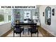 Well-lit office featuring a large window, modern decor, and a comfortable workspace at 122 Woodhall Way, Troutman, NC 28166