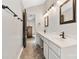 Elegant bathroom with double vanities, modern fixtures, and a neutral color palette at 1246 Winding Path Rd, Clover, SC 29710