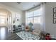 Playroom features neutral walls, a plush rug, and plenty of natural light at 12972 Canton Side Ave, Charlotte, NC 28273