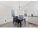 Cozy dining room with neutral paint, wood table and natural light at 1304 Browdis Ave, Kannapolis, NC 28083