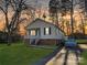 Beautiful home with a lush green lawn, brick foundation, and a covered car for added protection at 1304 Browdis Ave, Kannapolis, NC 28083