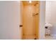 Small shower with yellow tile and a simple, functional design at 1330 College Ave, Shelby, NC 28152