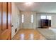 Welcoming foyer with neutral walls, tile flooring, and a door with sidelights at 1330 College Ave, Shelby, NC 28152