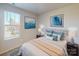 Serene bedroom with soft colors, plush bedding, and natural light from a large window at 1414 Windy Park Dr, Stanley, NC 28164