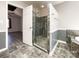 Updated bathroom features a tiled shower with a glass enclosure, neutral paint, and updated fixtures at 1589 E Lakewood Dr, Rock Hill, SC 29732