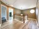 Landing area showcasing an octagonal window and neutral wall paint at 1589 E Lakewood Dr, Rock Hill, SC 29732