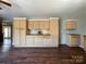 Kitchen featuring light wood cabinets and hardwood floors at 1589 E Lakewood Dr, Rock Hill, SC 29732