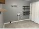 Laundry room featuring gray walls and floors and shelving at 1589 E Lakewood Dr, Rock Hill, SC 29732