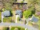Aerial view of the property, showing the house with lot lines and surrounding trees at 171 Longboat Rd, Mooresville, NC 28117