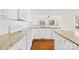 Kitchen area with granite countertops, white cabinets, and stainless steel appliances at 171 Longboat Rd, Mooresville, NC 28117