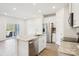 Modern kitchen featuring granite countertops, stainless steel appliances, and wood-look floors at 1748 Braemar Village Dr, Monroe, NC 28110