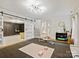 Home gym area with equipment, white walls, and a barn door at 19000 Hodestone Mews Ct, Davidson, NC 28036