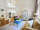 Cozy living room with high ceilings, a modern cabinet, and stylish accents at 19000 Hodestone Mews Ct, Davidson, NC 28036