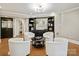 Inviting seating area with built-in shelving and neutral decor at 19000 Hodestone Mews Ct, Davidson, NC 28036