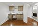 Dedicated office space with built-in desk, cabinets, and natural light, ideal for work or hobbies at 19000 Hodestone Mews Ct, Davidson, NC 28036