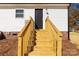 New wooden stairs lead to the back entrance of the house at 2005 Sugar Hill Rd, York, SC 29745