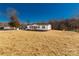 Well-maintained single-story home with black shutters and a long driveway at 2005 Sugar Hill Rd, York, SC 29745