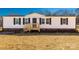 Close-up of a charming single-story home with a well-maintained yard and inviting entrance at 2005 Sugar Hill Rd, York, SC 29745