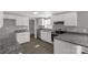 Well-lit kitchen featuring gray countertops and modern stainless steel appliances at 2005 Sugar Hill Rd, York, SC 29745