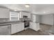 Well-lit kitchen with modern stainless steel appliances and a breakfast bar at 2005 Sugar Hill Rd, York, SC 29745