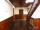 Inviting foyer featuring hardwood floors, wood-paneled walls, and a classic staircase at 201 W Rice St, Landis, NC 28088