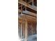 Framed interior under construction, showcasing wooden beams and electrical wiring at 201 W Rice St, Landis, NC 28088