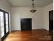 Cozy living room with hardwood floors and a classic fireplace at 201 W Rice St, Landis, NC 28088