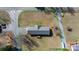 An aerial view of a single-story house with a metal roof and a large yard at 2028 Hendil St, Conover, NC 28613