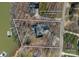 Aerial view of a lakeside property with lush surroundings and a private dock, with the lot lines displayed at 213 Patternote Rd, Mooresville, NC 28117