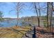 Stunning lake view featuring a private dock and tranquil waters, perfect for boating and relaxation at 213 Patternote Rd, Mooresville, NC 28117