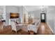 Cozy living room featuring hardwood floors, comfortable seating, and neutral tones for a welcoming atmosphere at 213 Patternote Rd, Mooresville, NC 28117