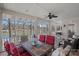 Enclosed porch area with tile floors and seating and a view of the lake at 213 Patternote Rd, Mooresville, NC 28117