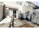 Exterior backyard with white siding, gravel, cement patio, and a sliding glass door at 2511 Brackley Nw Pl # 1013, Concord, NC 28027