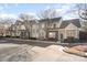 View of well-maintained townhomes with manicured landscaping and ample parking at 2511 Brackley Nw Pl # 1013, Concord, NC 28027