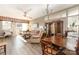 Living room with hardwood floors leading to the eat-in kitchen at 2511 Brackley Nw Pl # 1013, Concord, NC 28027