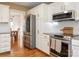 Modern kitchen features stainless appliances, granite countertops and white cabinets at 2520 Foxworth Dr, Monroe, NC 28110