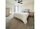 Main bedroom features carpeted floors, a ceiling fan, and ensuite bathroom access at 2847 Legacy Ridge Ln, Catawba, NC 28609