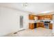 Kitchen featuring wooden cabinets, neutral countertops, and stainless steel appliances at 2888 Robinson Rd, Newton, NC 28658