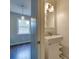 Stylish bathroom featuring a modern vanity, sleek fixtures, and bright lighting, enhancing the home's contemporary appeal at 307 French St, Charlotte, NC 28216