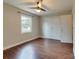 Bedroom featuring hardwood floors, natural light and a double door closet at 307 French St, Charlotte, NC 28216