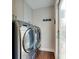 Efficient laundry room with modern stainless steel washer and dryer, providing convenience and style in a functional space at 307 French St, Charlotte, NC 28216