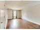 Cozy living room features wood floors, natural light, and neutral wall colors at 307 French St, Charlotte, NC 28216
