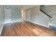 Spacious living room featuring modern wood flooring and natural light at 307 French St, Charlotte, NC 28216